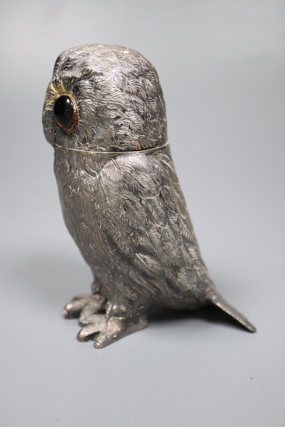 A 1970s novelty silver pepperette, modelled an owl with glass eyes, Edward Barnard & Sons Ltd, London, 1972, 11.3cm,